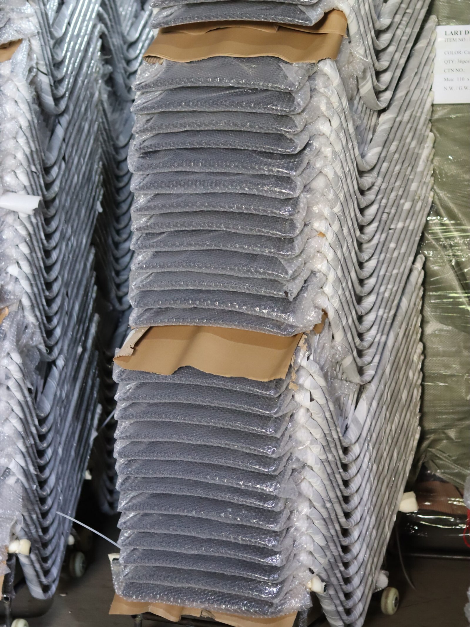 Protected outdoor furniture components prepared for packing